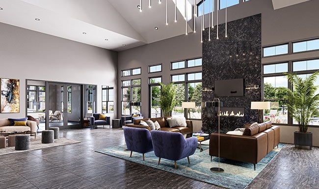 lobby with large chandelier seating  and couches