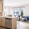 a kitchen with a dining table and chairs